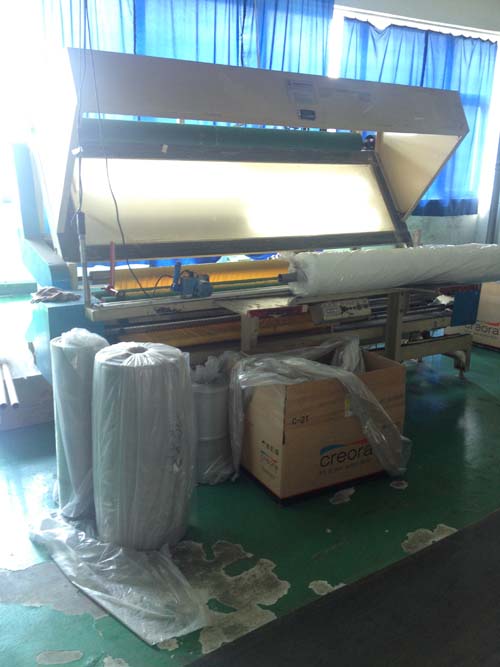 驗布機